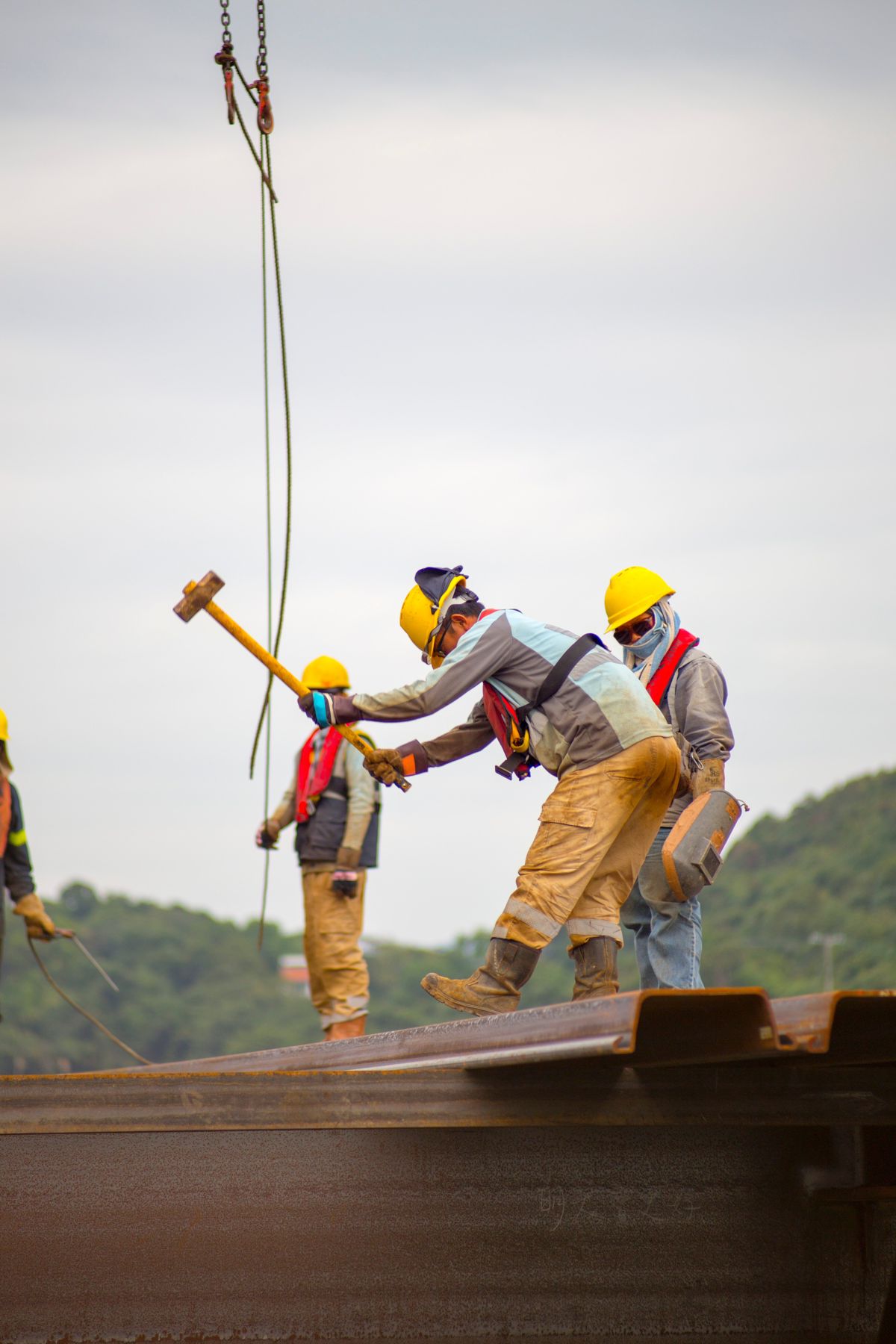 construction worker with a sledge hammer