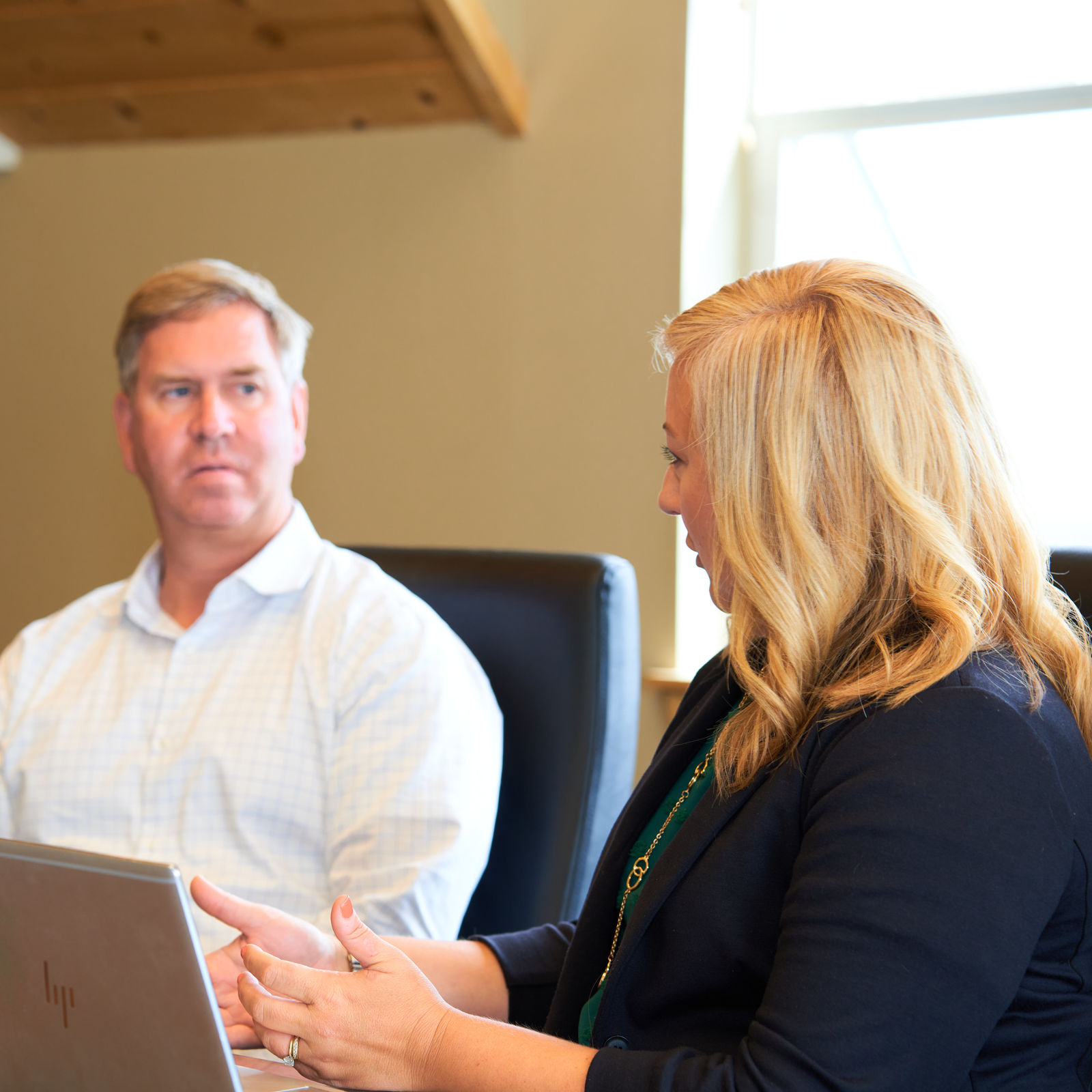 man and a woman in a meeting