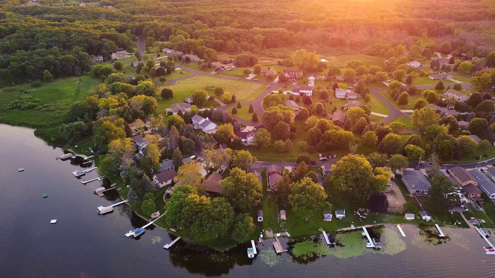 overhead view of a neighborhood on a lake